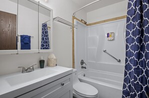 Hair dryer, towels, soap, shampoo