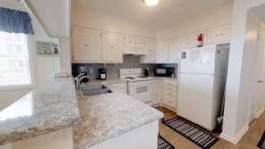 Fridge, microwave, dishwasher, coffee/tea maker