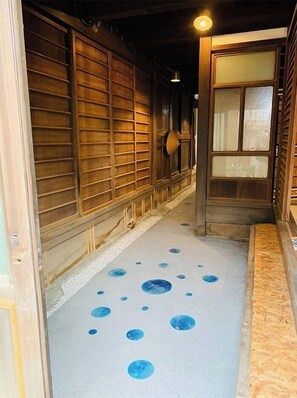Traditional architecture meets authentic charm in this historic hallway.