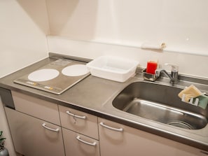 Fridge, microwave, stovetop, cookware/dishes/utensils