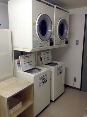 Convenient laundry facilities offer two washing machines and two dryers for guest use.