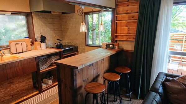 Fridge, microwave, stovetop, cookware/dishes/utensils