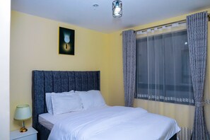 2 habitaciones, tabla de planchar con plancha, wifi y ropa de cama 