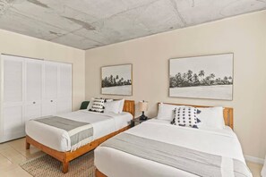 1 bedroom, desk, iron/ironing board, travel crib