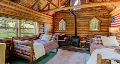 Remote, comfortable rustic cabins, tranquil stream-side, nature at your doorstep