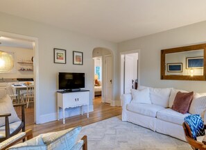 TV, fireplace, books