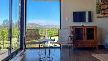 Deluxe Double Room, Vineyard View | In-room safe, iron/ironing board, free WiFi, bed sheets