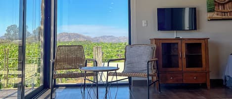 Deluxe Double Room, Vineyard View | In-room safe, iron/ironing board, free WiFi, bed sheets