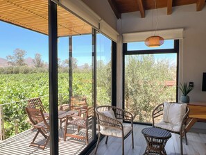 Family Double Room, Vineyard View | Living area | 32-inch Smart TV with digital channels, TV, Netflix