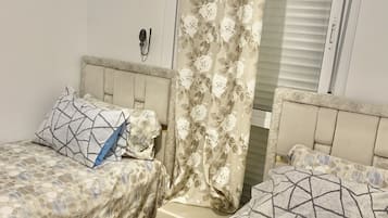2 slaapkamers, een strijkplank/strijkijzer, gratis wifi, beddengoed