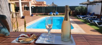 4 bedroom LUXURY villa with AC, private heated pool, XBOX and all the amenities!