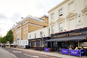 Experience the charm of a traditional pub in a historic area.