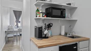 Fridge, microwave, coffee/tea maker, toaster