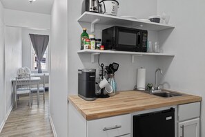Fridge, microwave, coffee/tea maker, toaster - Urban Suites at Gather - 2nd Floor Studio (Niles)