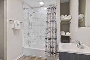 Shower, hair dryer, towels, soap - Urban Suites at Gather - 2nd Floor Studio (Niles)