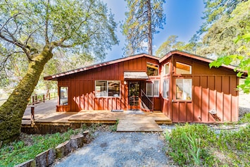 Image of Serene cabin with large deck, woodstoves & trail to river beach - dog-friendly