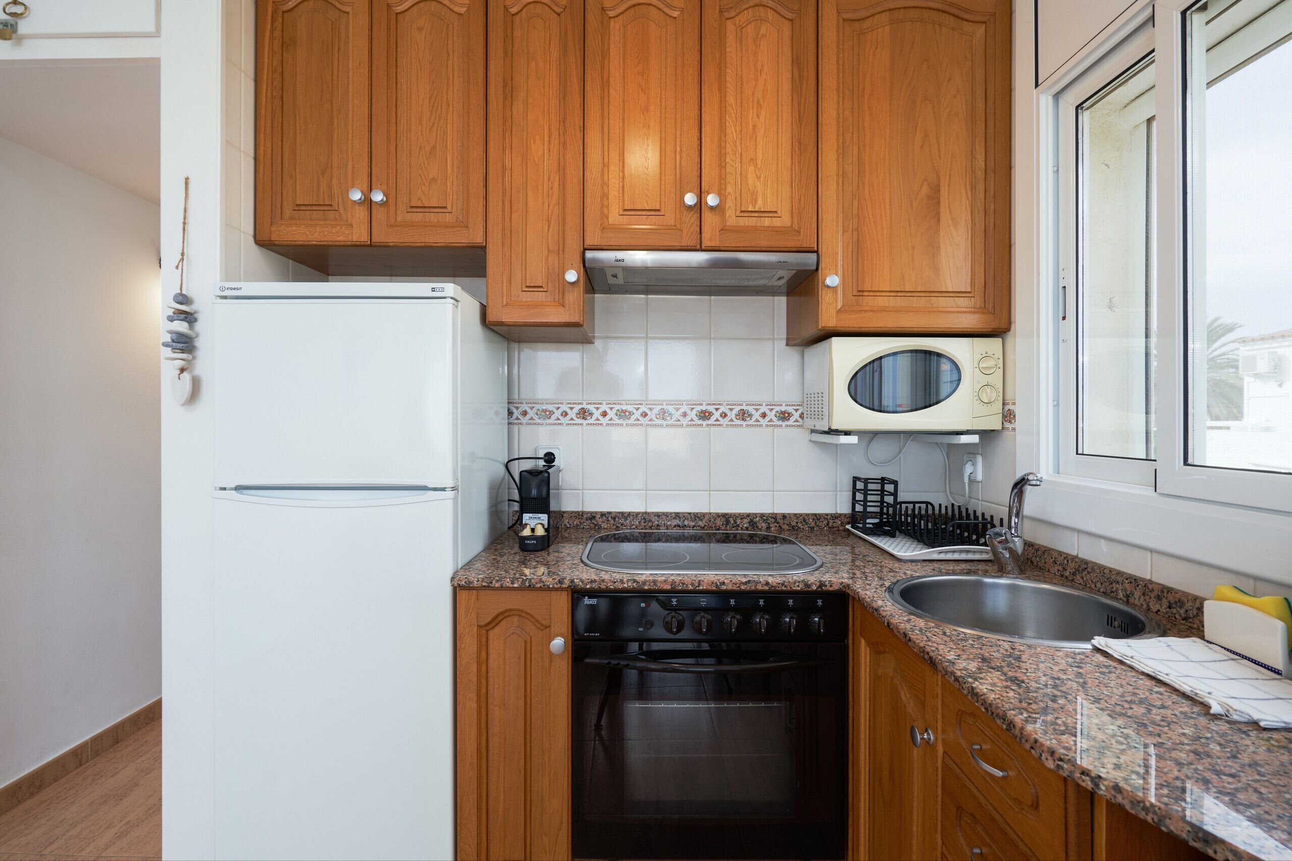 Fridge, microwave, coffee/tea maker, electric kettle