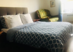 Iron/ironing board, travel crib, free WiFi, bed sheets
