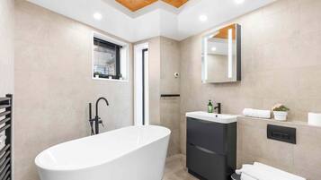 Bathtub, hair dryer, towels