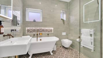 Bathtub, hair dryer, towels