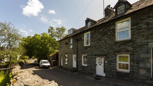 A stone-built row house with a car parked in front. - Oak Cottage, Chapel Stile (Chapel Stile)