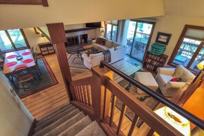 TV, fireplace, books, music library