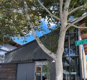 A building with a sign reading "BEAST+BOUNTY" and a street sign indicating "17th ST 1700". -  New/Midtown Sac/Free Parking/Coffee/Long stays welcomed (Sacramento)