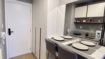 Fridge, stovetop, coffee/tea maker, toaster