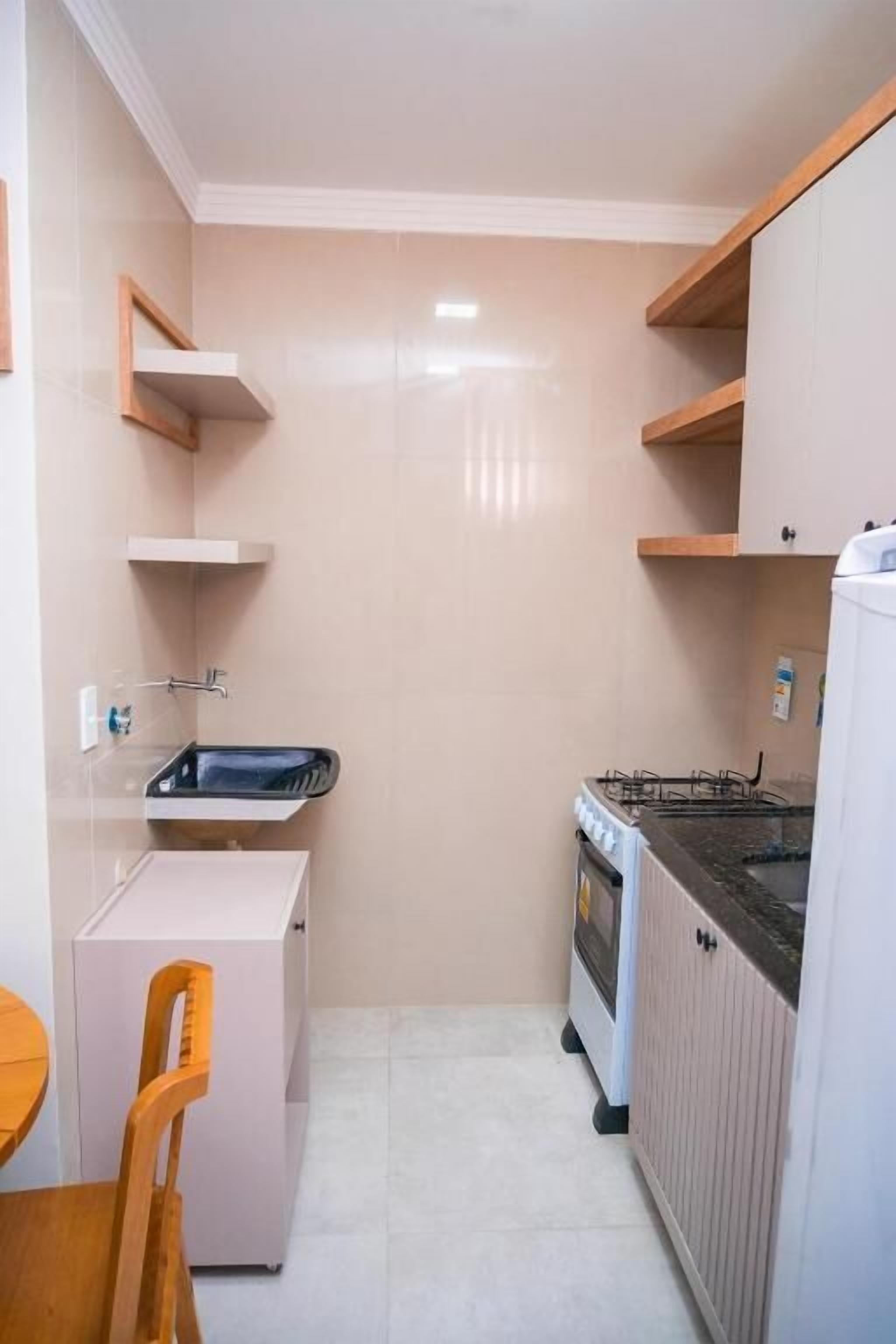 Fridge, oven, cookware/dishes/utensils, dining tables