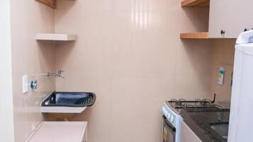 Fridge, oven, cookware/dishes/utensils, dining tables