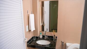 Shower, rainfall showerhead, towels, soap