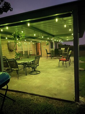Outdoor dining - 4- Bedroom Serenity: 8 Beds Your Peaceful Retreat: Television in Every Bedroom (Port Arthur)