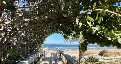 Walk to the beach! Spacious home with comfy beds, game room, & fenced yard.