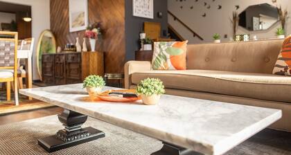 Cozy, pet friendly, Mid-Century style home loaded with books, movies, games.