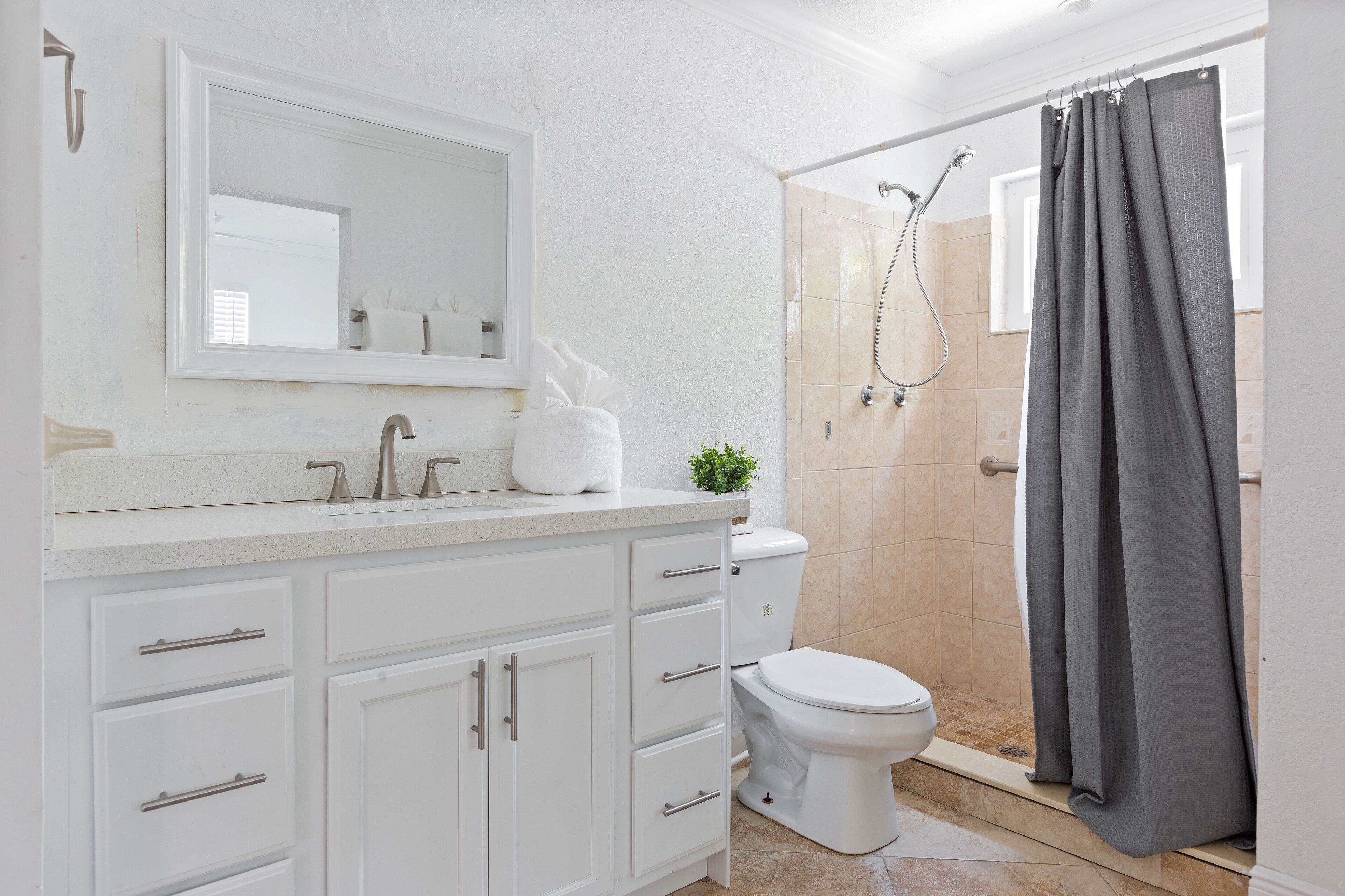 Combined shower/tub, hair dryer, towels, soap