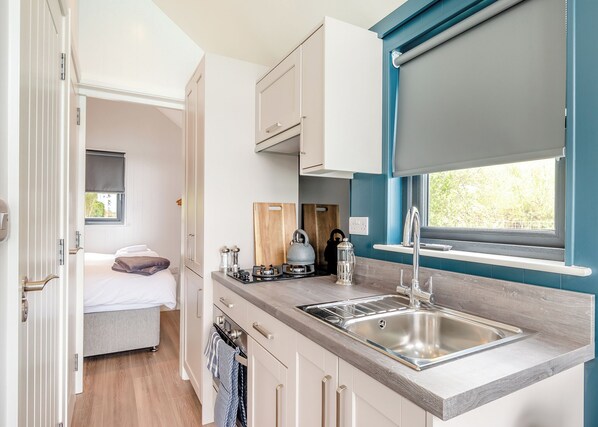 Refrigerador, horno, parrilla de estufa y tostadora 