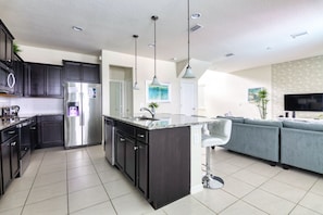 House, Multiple Beds (Vikram's Stylish Windsor at Westside ) | Private kitchen | Electric kettle, toaster, dining tables - Vikram's Stylish Windsor at Westside Home (Kissimmee)