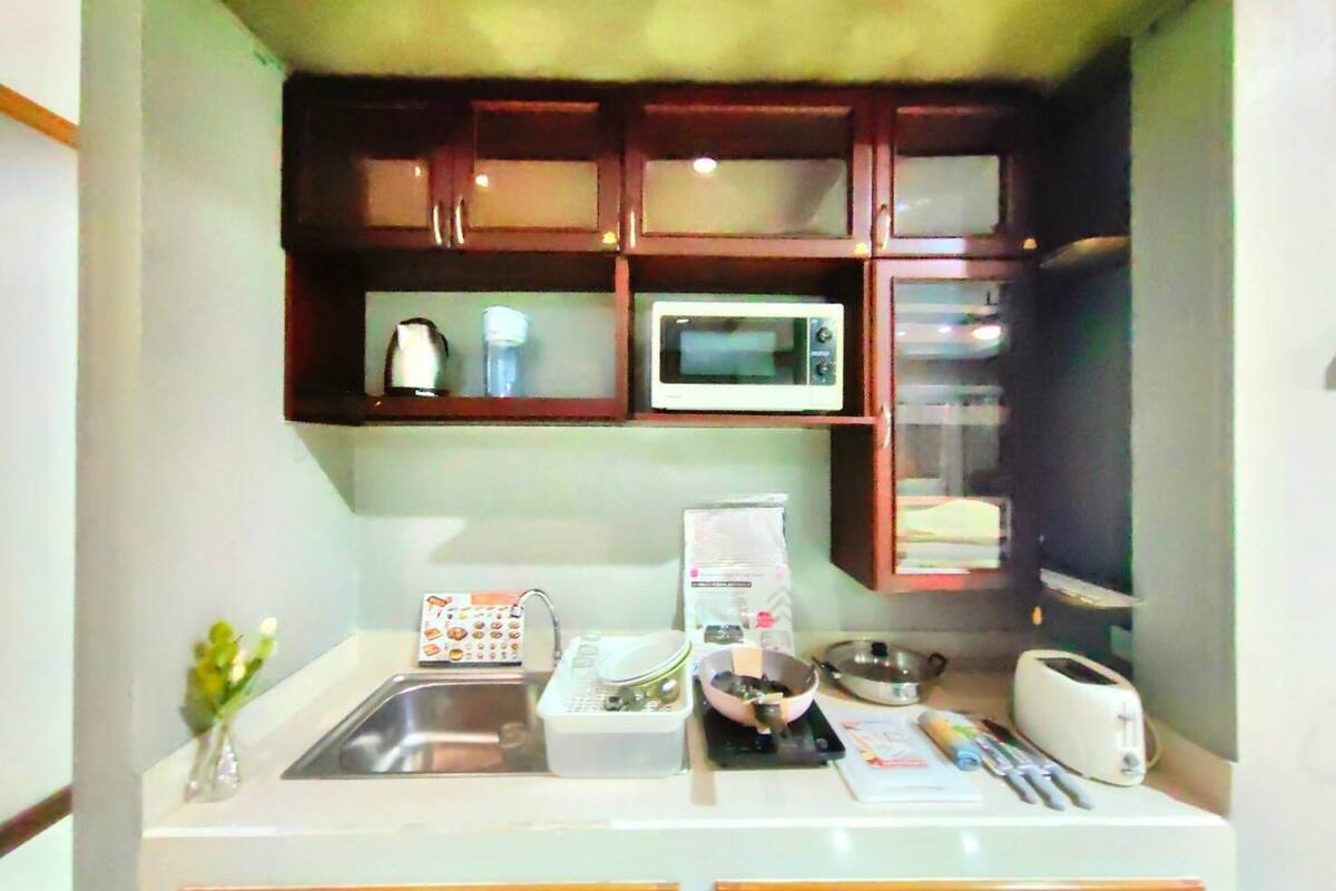 deluxe quadruple room | private kitchen | fridge, microwave, toaster, rice cooker