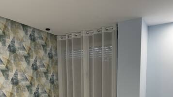 Habitación Deluxe | Ropa de cama de alta calidad, edredón y camas Tempur-Pedic