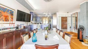 Villa | Private kitchen | Fridge, microwave, oven, stovetop