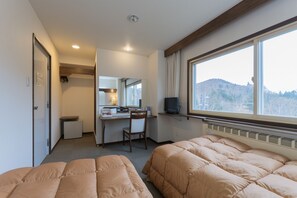 Eenvoudige Twin kamer, 2 eenpersoonsbedden | Een kluis op de kamer, gratis wifi, beddengoed