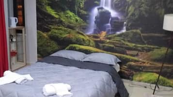 Quarto triplo exclusivo | 1 quarto, escrivaninha, Wi-Fi de cortesia, roupa de cama