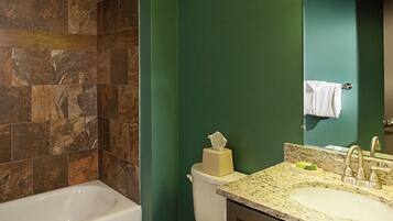 Combined shower/bathtub, hair dryer, towels, soap