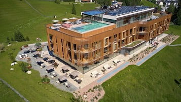 Experience the unique architecture and enjoy the rooftop pool and outdoor seating area.