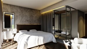 A modern bedroom with a large bed, a bedside table, a chair, and a glass partition. - NEWCC HOTEL & SERVICED APARTMENT (Truong Quang Trong)