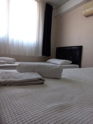 Economy Triple Room | Minibar, laptop workspace, free WiFi, bed sheets - Blue Otel (Cesme)