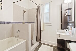 Bathtub, jetted bath, hair dryer, towels