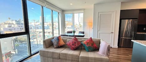 Deluxe Apartment, 1 Bedroom | Living area | 55-inch Smart TV with digital channels, TV, Netflix