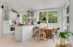 Fridge, stovetop, dishwasher, coffee/tea maker