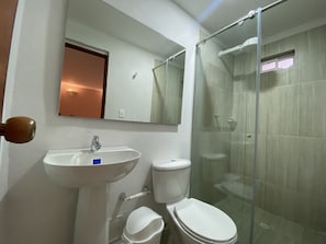 Shower, hair dryer, towels, soap
